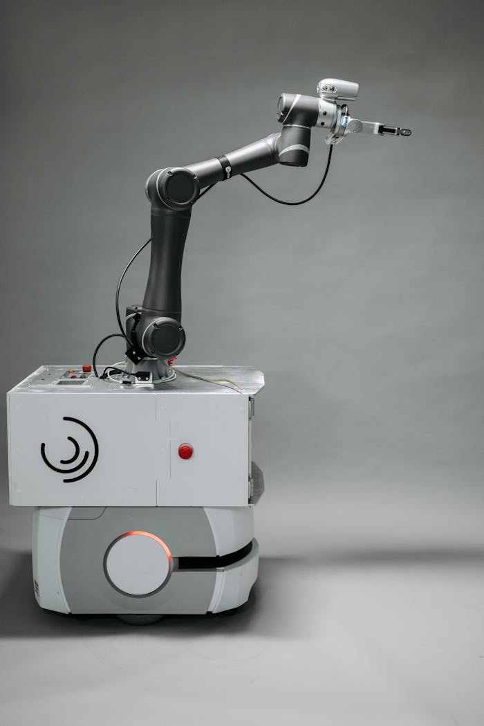 Explore cutting-edge robotic arm designed for modern industrial applications. Ideal for tech and AI themes.